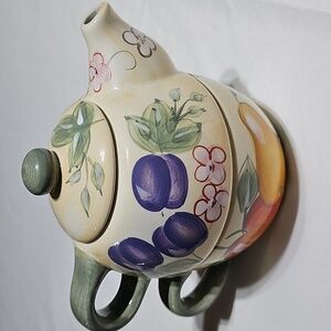 Teapot and cup Nesting for one